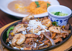 Sizzling meat and shrimp platter